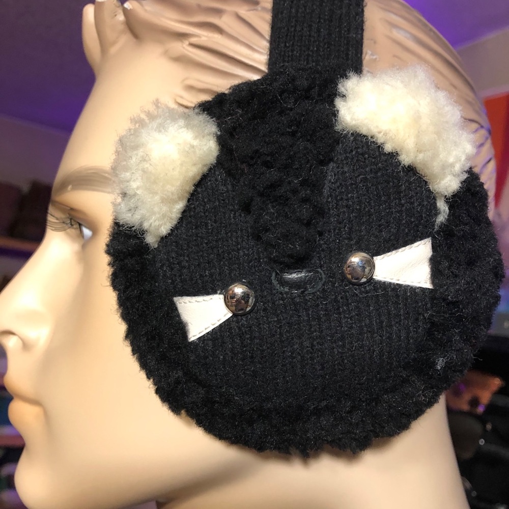 Coach raccoon earmuffs